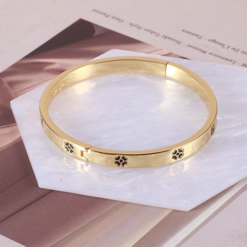 Kate Spade Hand-Painted Enamel Black and White Clover Flower Bangle